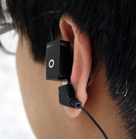 Thanko Microsports Tiny MP3 Player on ear back