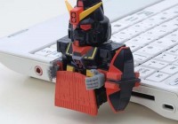 Bandai Gundam GNO3 USB Flash Drive attached to notebook