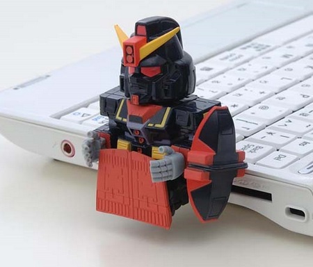 Bandai Gundam GNO3 USB Flash Drive attached to notebook