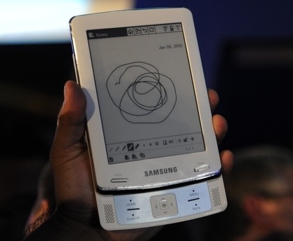 Samsung E6 e-book reader on hand