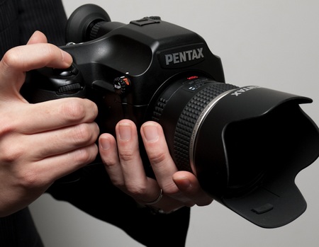 Pentax 645D Medium-Format DSLR Camera on hand