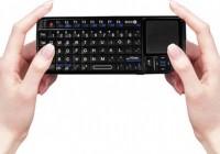 SiTouch Mini Wireless Keyboard with Touchpad on hand