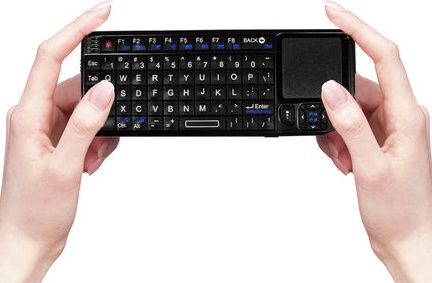 SiTouch Mini Wireless Keyboard with Touchpad on hand