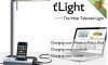 M&C tLight Desk Lamp docks iPod iPod, charges notebook and cellphone