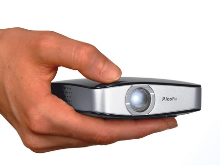 Philips PicoPix 1020 pico projector on hand