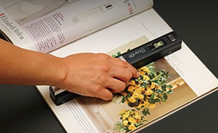 Exemode ScanBit MHS-10 Portable Scanner in use