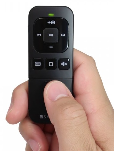 Satechi Bluetooth Multimedia Remote for iOS Device on hand