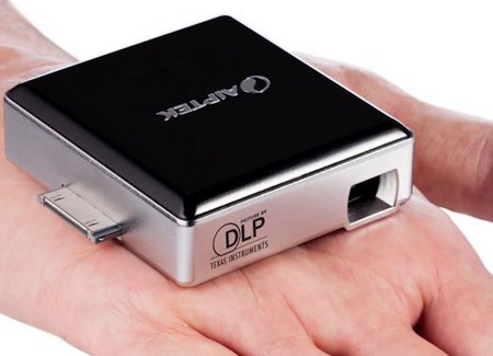 Aiptek MobileCinema i50D pico projector dongle for ios devices on hand