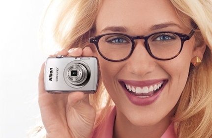 Nikon CoolPix S01 Ultra-compact Digital Camera on hand