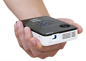 AAXA P2 Jr Pico Projector with HDMI input on hand